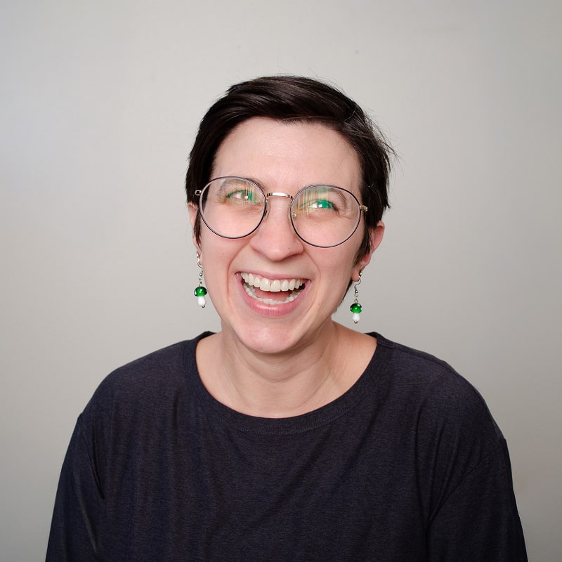 Image of Anna in a black shirt laughing